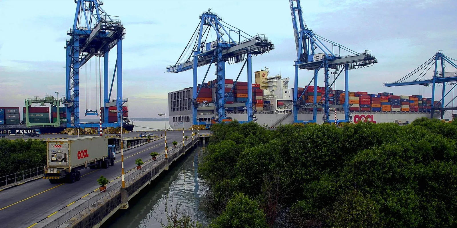 Container vessel and cranes at Northport in Port Klang